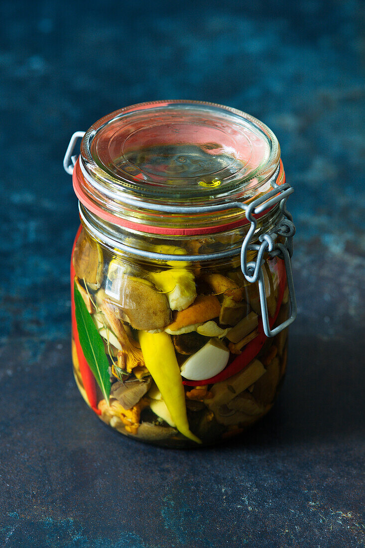 Pickled mushrooms in a glass jar