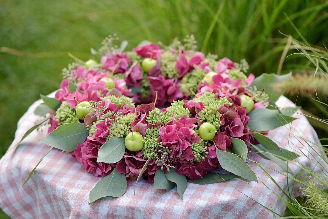 Wreath of hydrangeas, sedum and eucalyptus