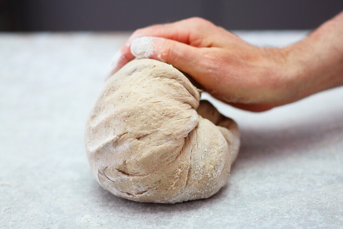 Kneading bread dough for farmhouse bread