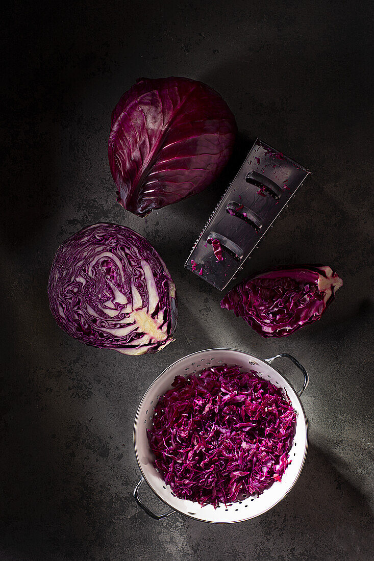 Red cabbage whole, cut, and sliced