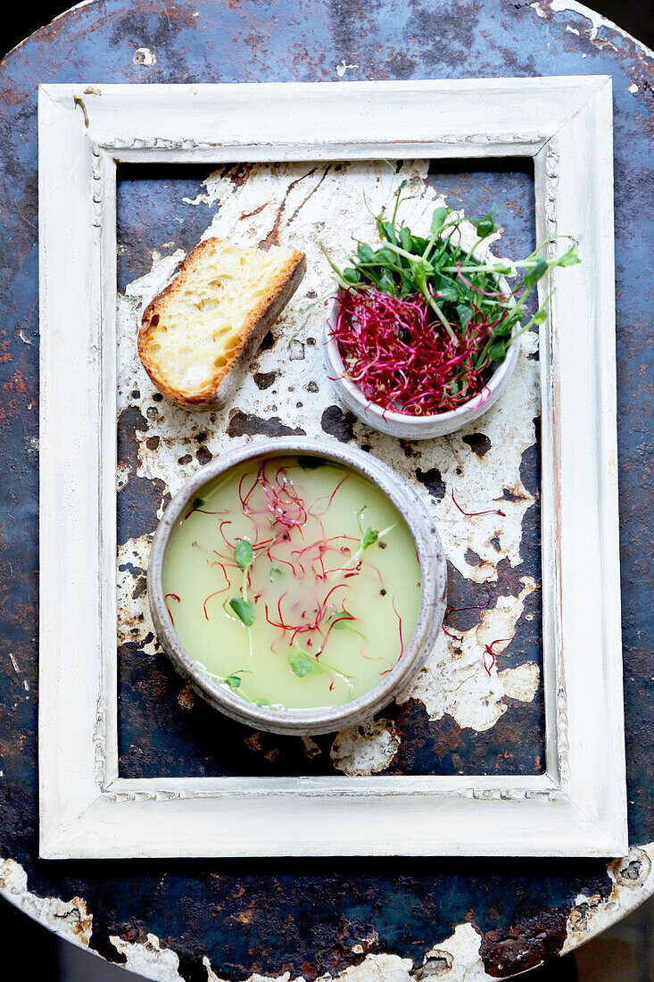 Peas soup with fresh sprouts