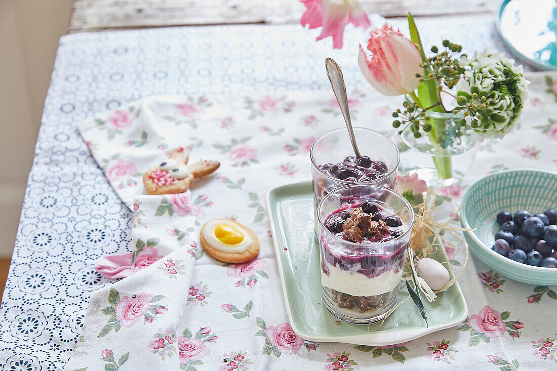 Layered dessert with panna cotta and blueberries