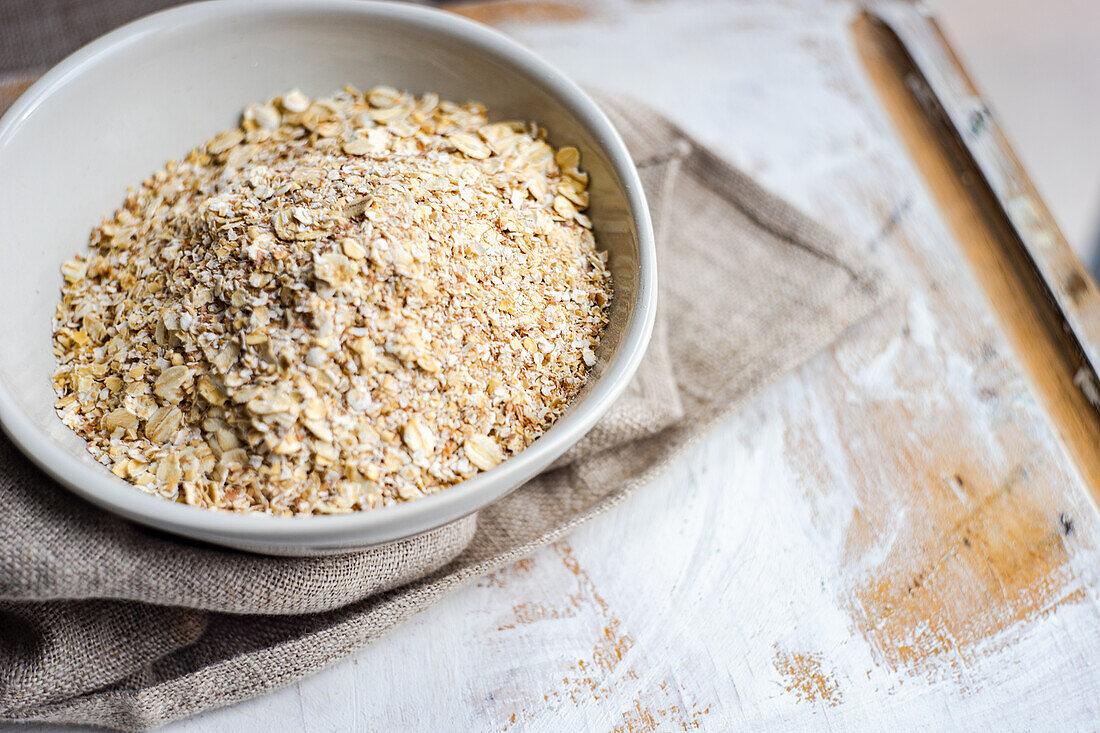 Raw organic oatmeal in the bowl