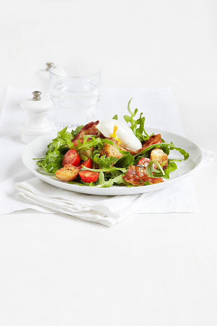 BLT salad with poached egg and black pepper croutons