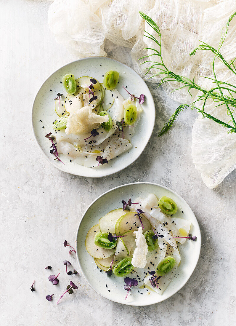 Cod ceviche with rice paper chips and mini kiwi