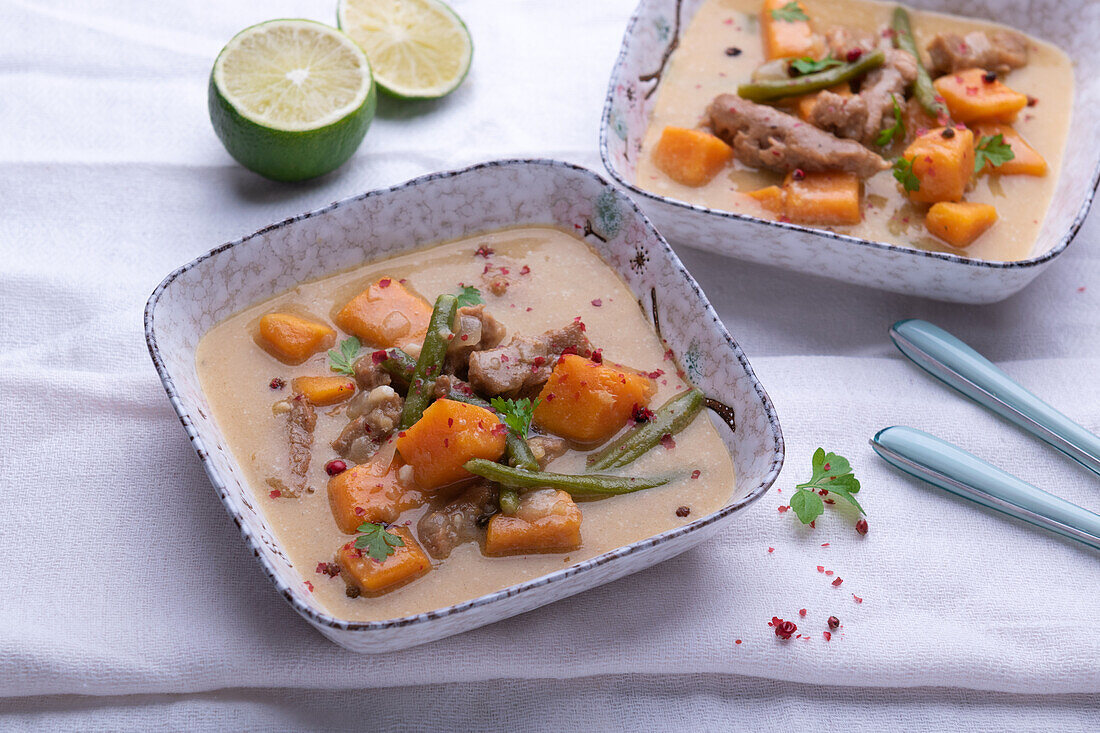 Vegan sweet potato and coconut curry with soy meat and green beans