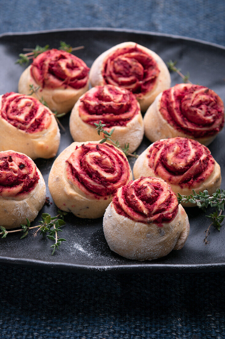Vegan flaxseed yeast buns filled with beetroot hummus