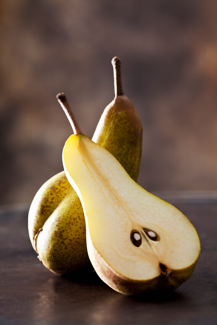 Whole and sliced pear