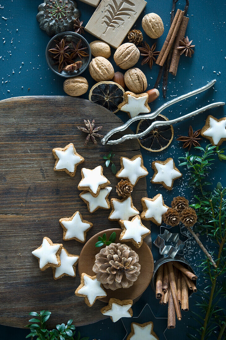 Cinnamon stars, star anise, cinnamon sticks, nutcracker and pine cones