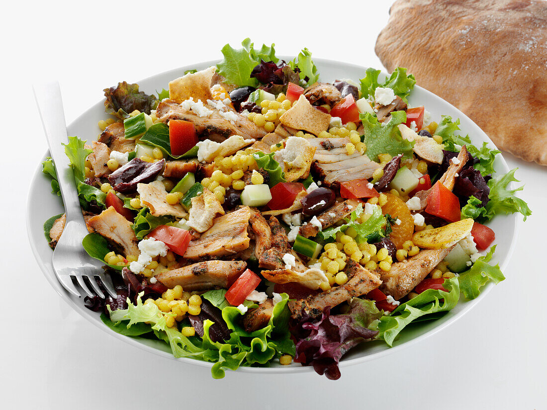 Mediterranean chicken salad with pita bread
