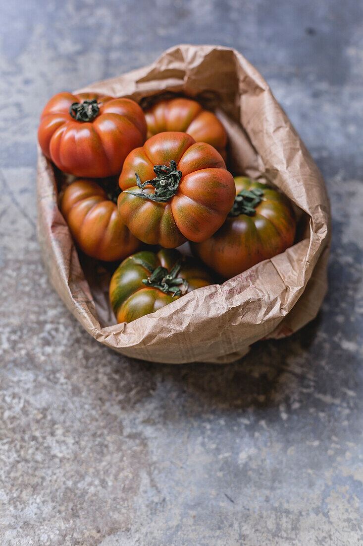 Sardinian beef tomatoes in paper bag