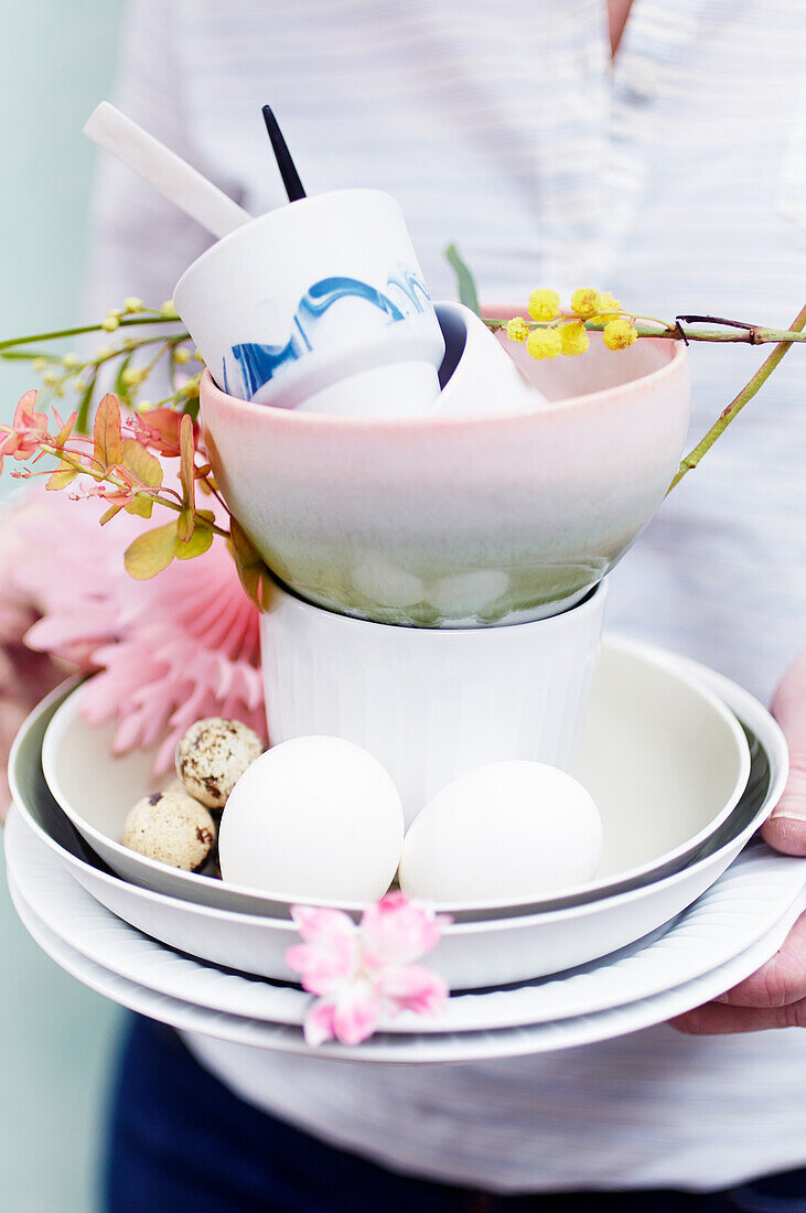 Ceramic bowls with flowers and Easter eggs