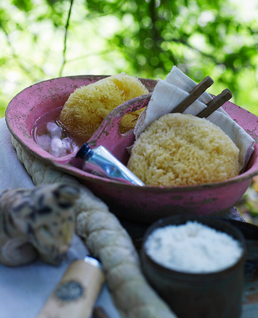 Vintage bowl with bath utensils