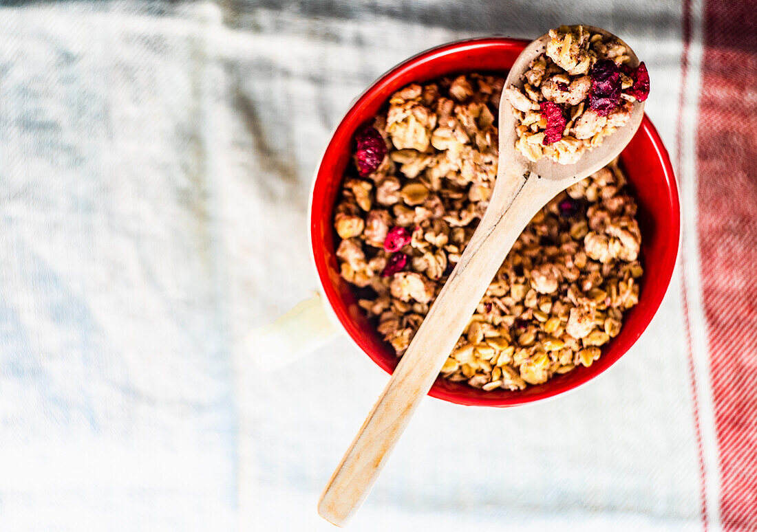 Healthy breakfast with granola and dried cherries