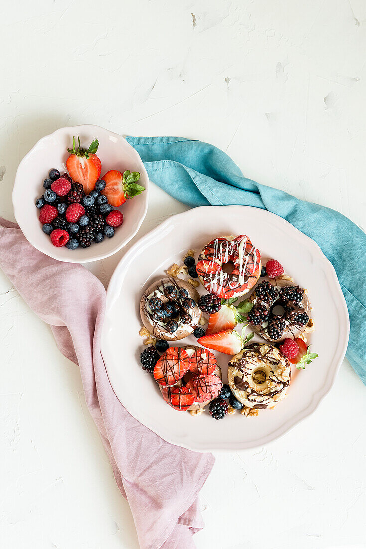 A selection of protein-rich doughnuts with berries