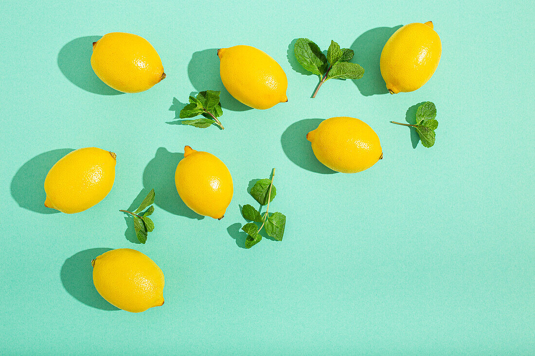 Fresh yellow lemons with mint