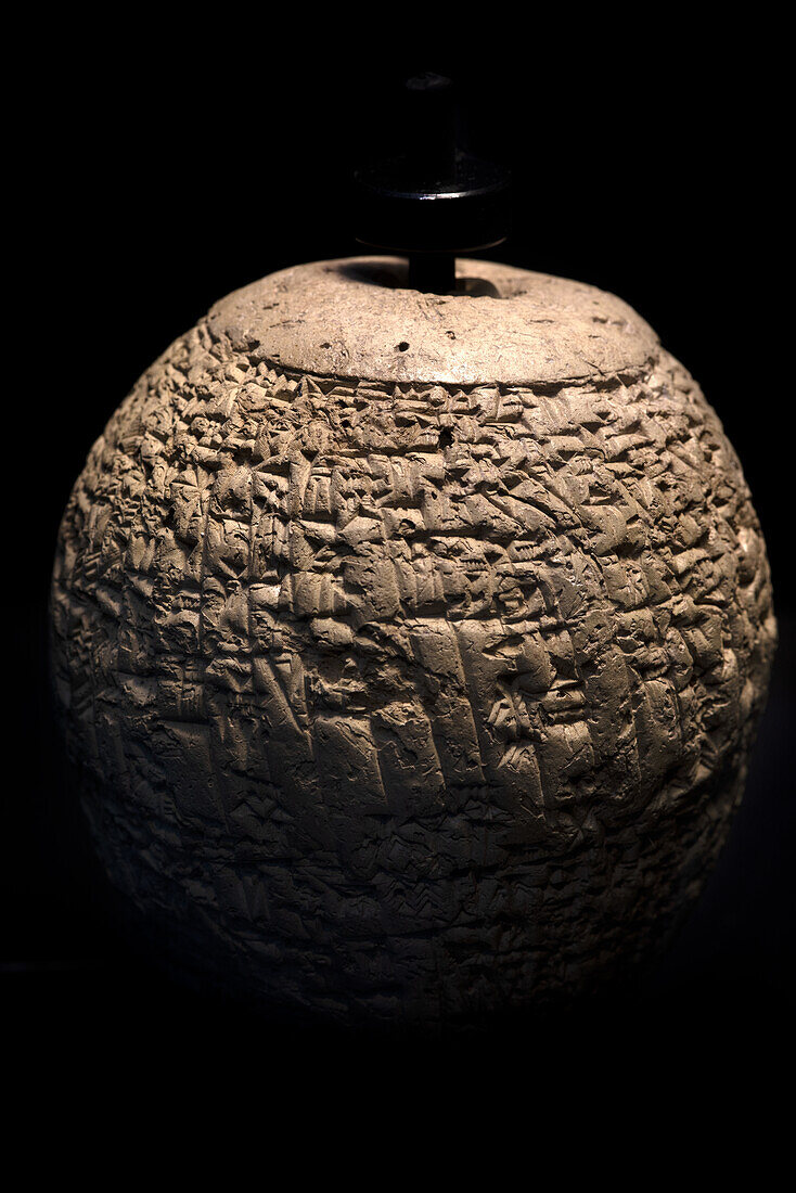 Cuneiform script on terracotta sphere