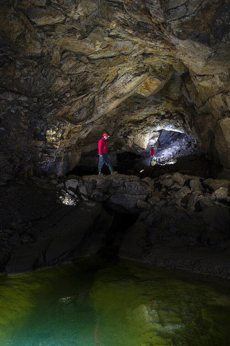 Cave scientists in Krizna Jama Cave, Slovenia