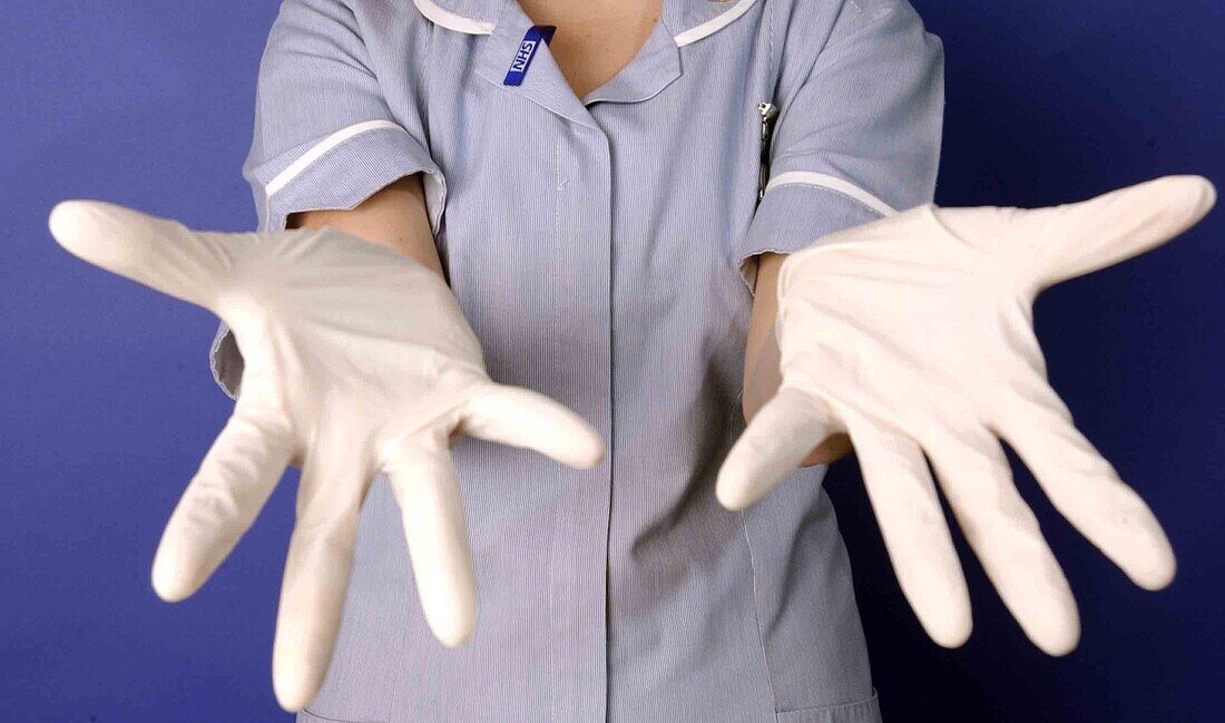 Nurse with open gloved hands