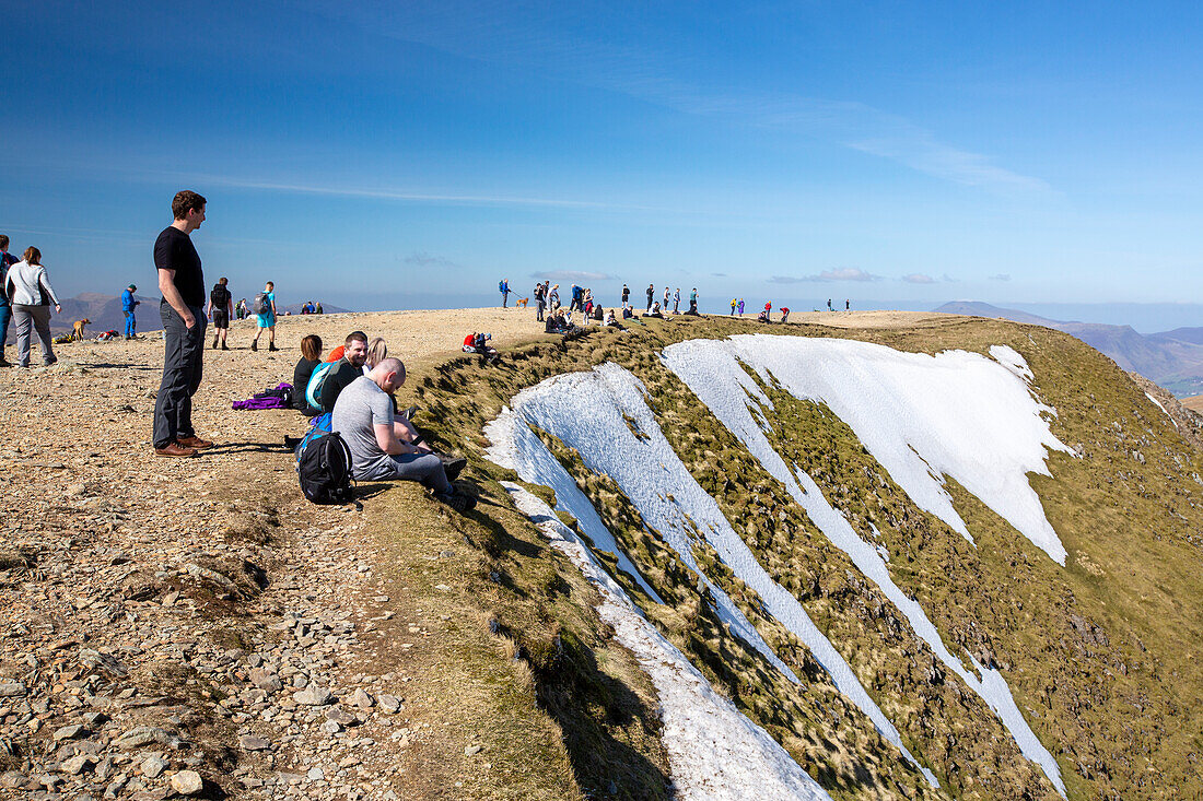 Crowds on the summit of Helvellyn, Lake District, UK