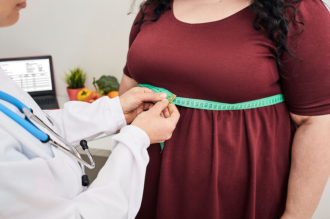 Measuring woman's waist