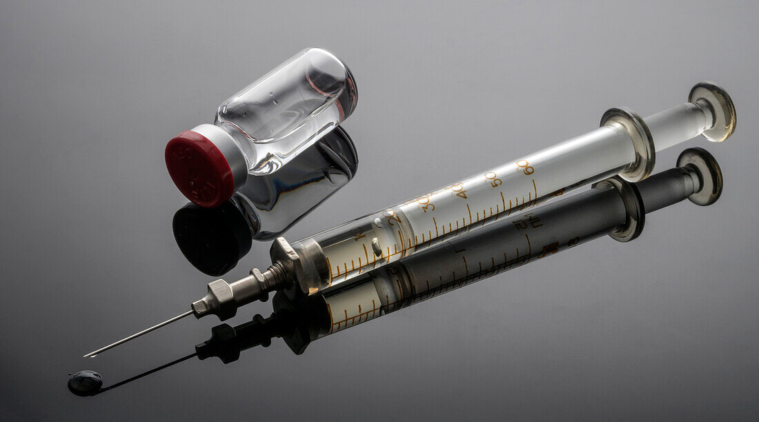 Vintage syringe and phial