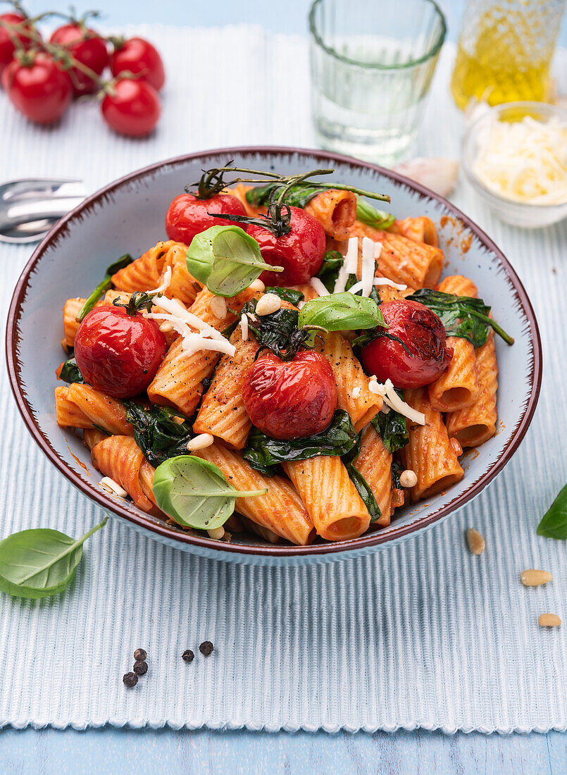 Tortiglioni with spinach, grilled vine tomatoes and pine nuts