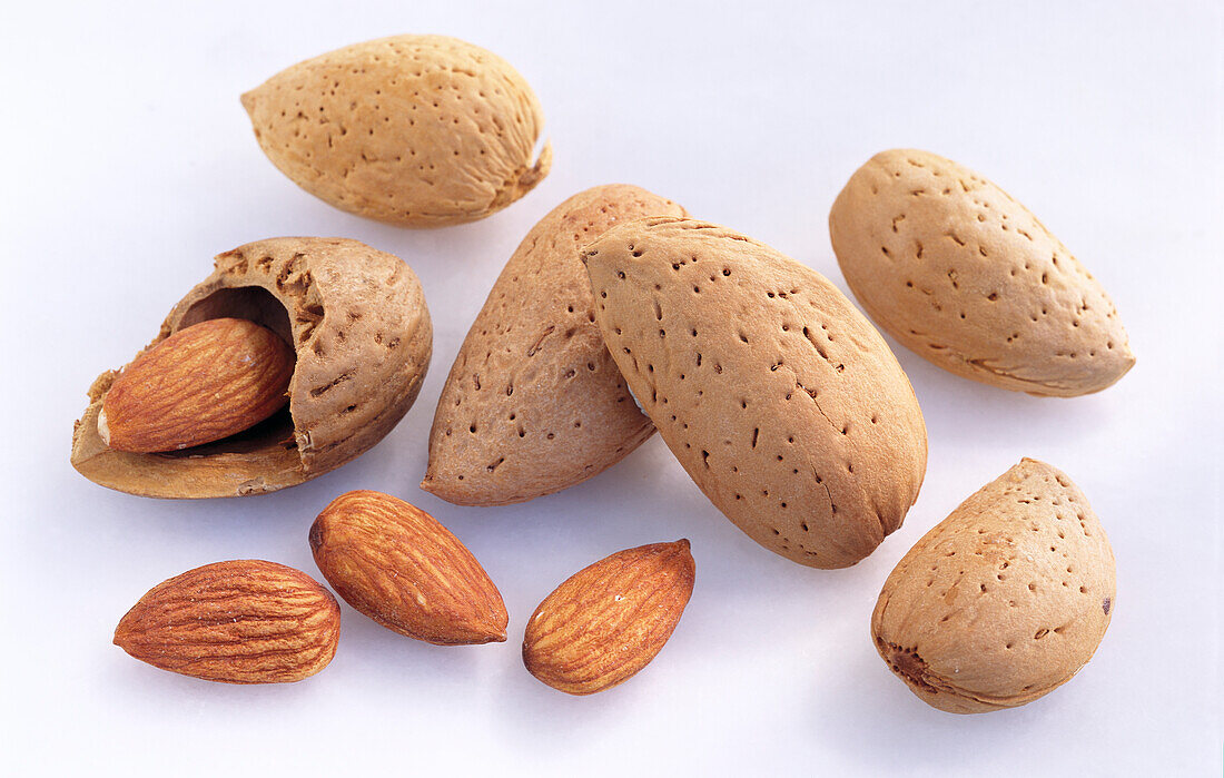 Whole and cracked almonds