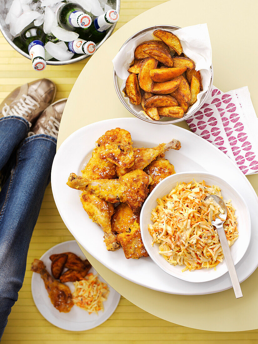 Southern fried chicken with mustard coleslaw and paprika potato wedges