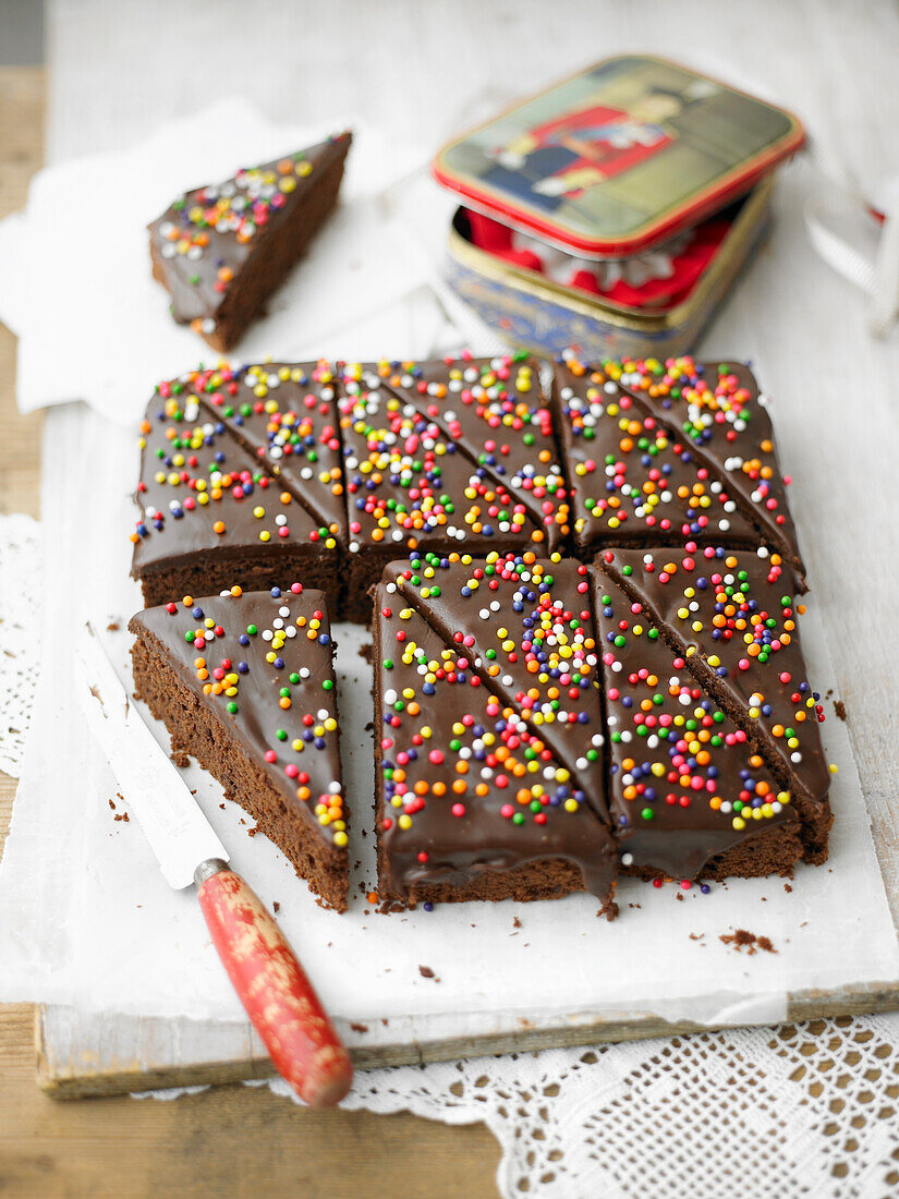 Chocolate fudge cake with coloured sugar pearls