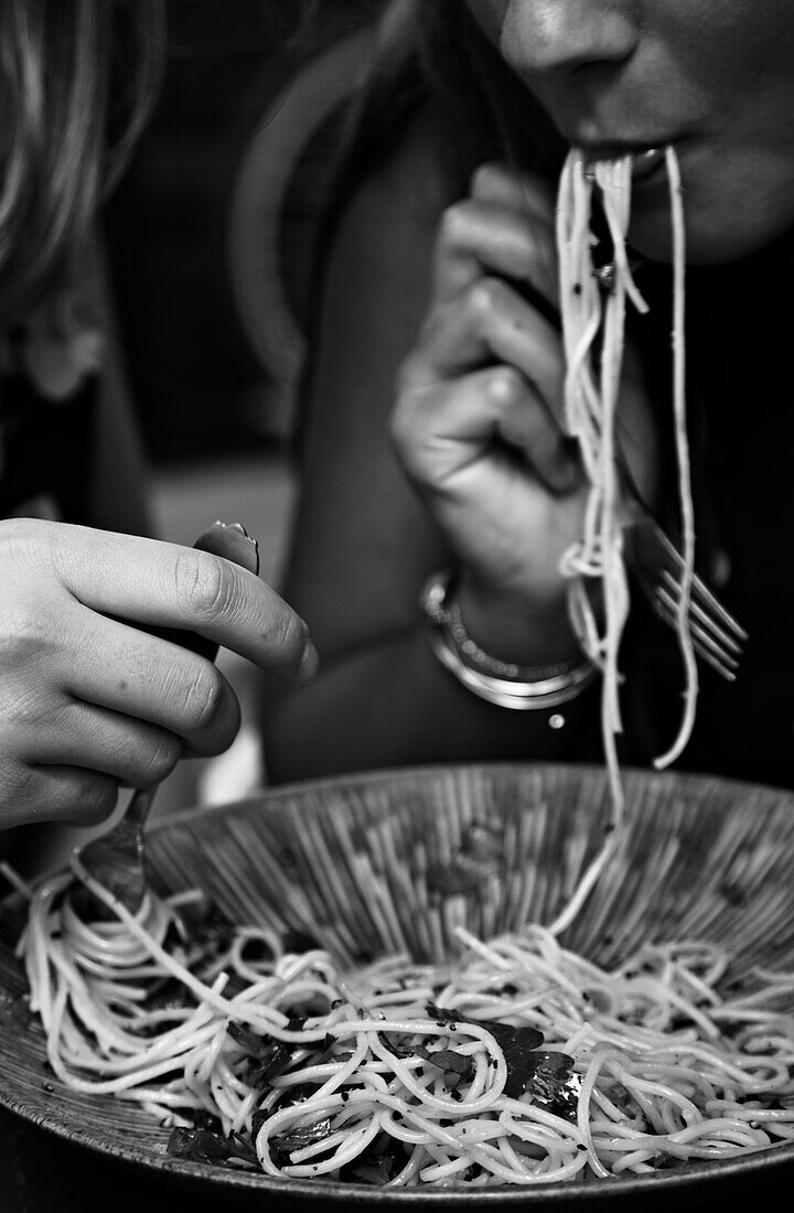 Linguine with black pepper, pecorino, parsley and pancetta (b-w photo)