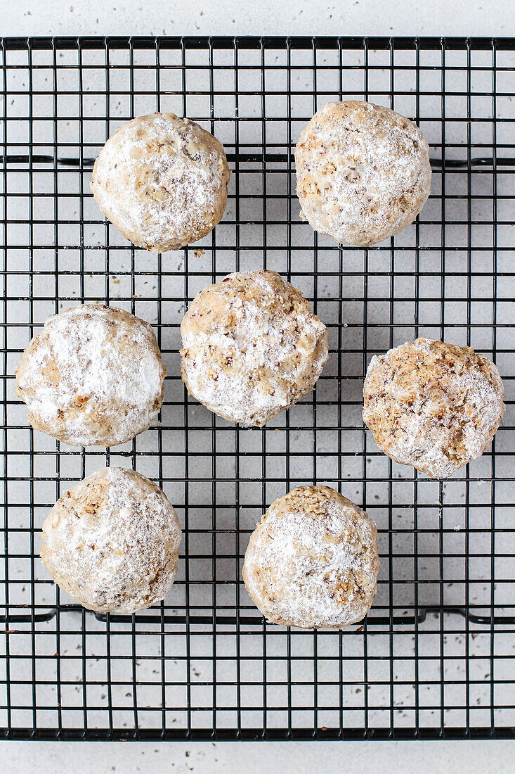 Pecan biscuits with icing sugar