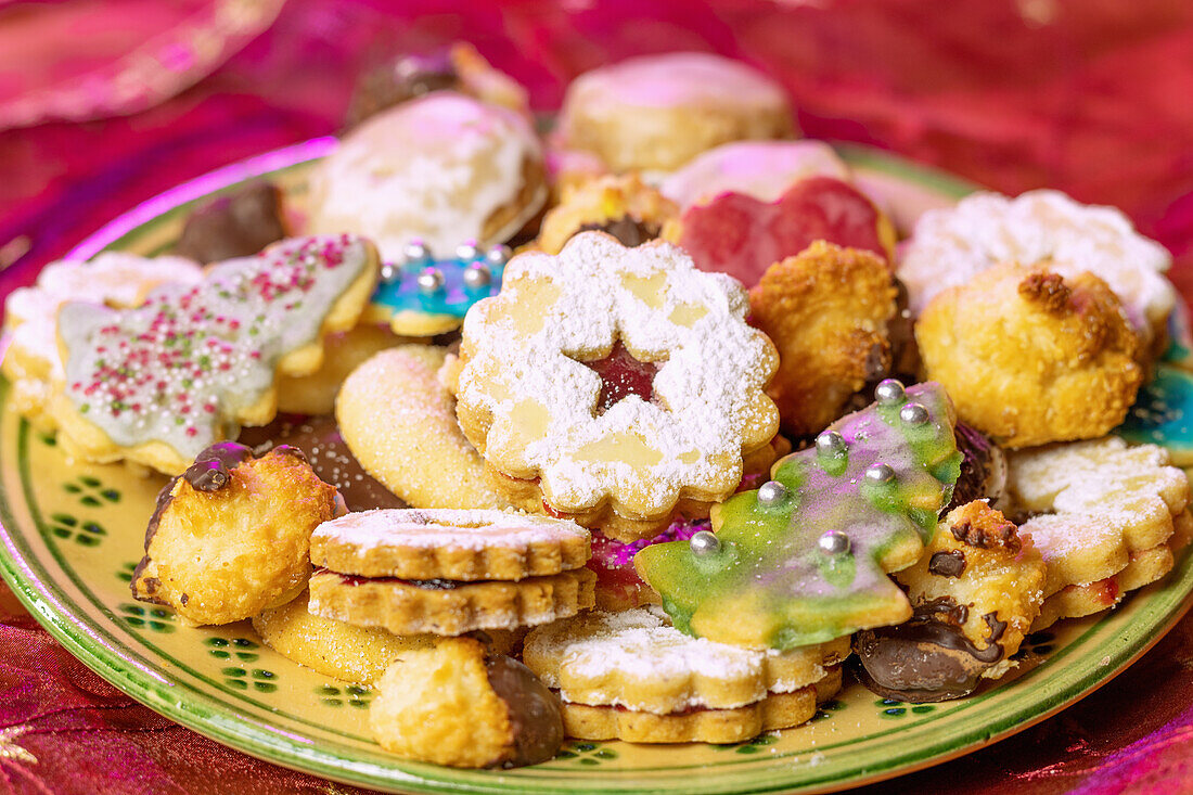 Various Christmas biscuits on a plate