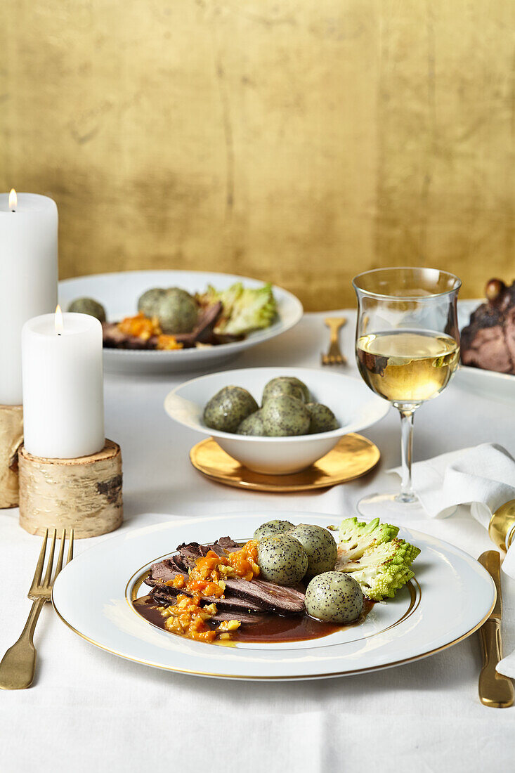 Leg of venison with physalis chutney, romanesco and poppy seed dumplings