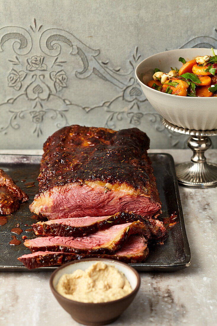 Roast beef in tomato-balsamic rub with sweet potato-harissa salad