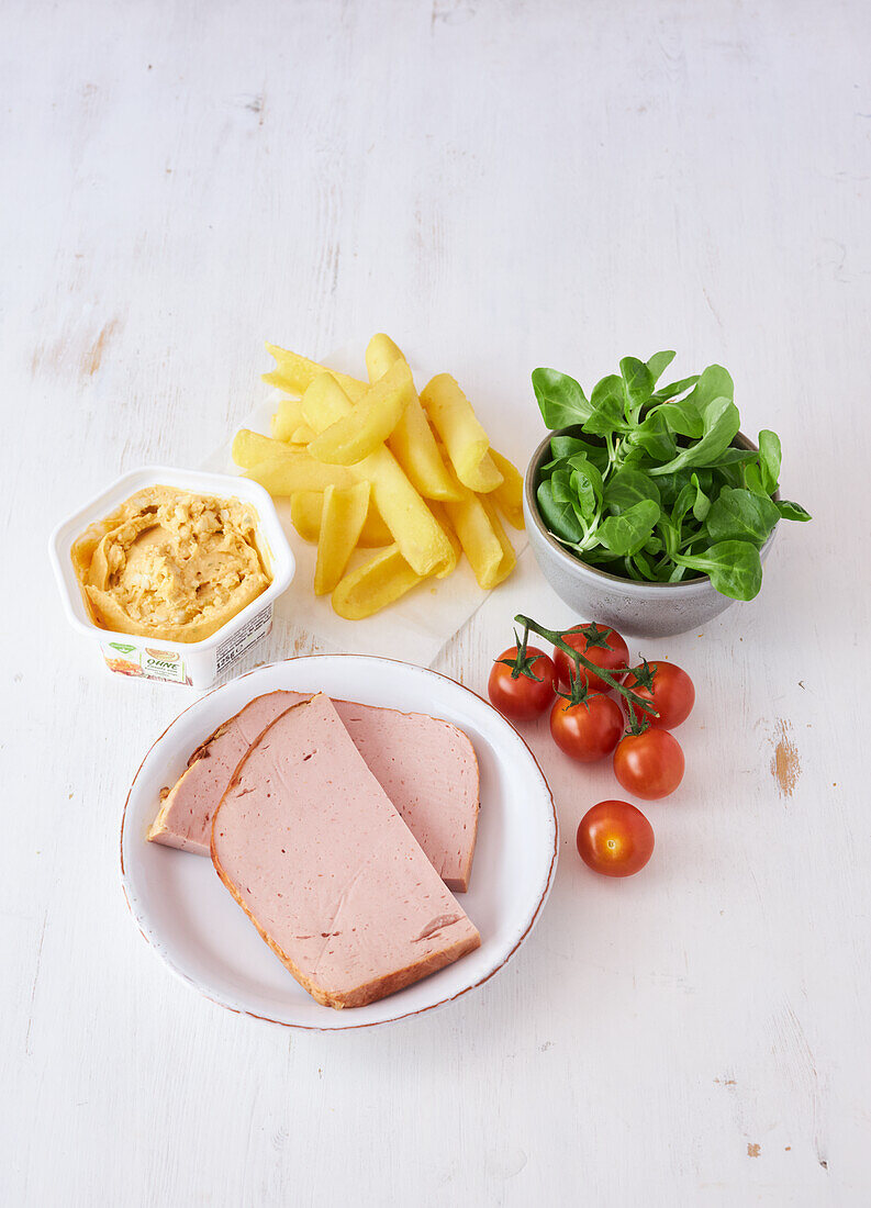 Ingredients for a Bavarian potato dish with meatloaf