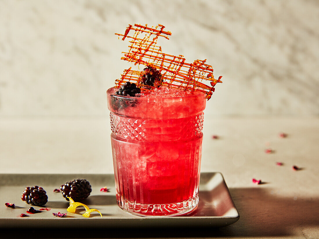 The Bramble (gin with sugar syrup and blackberries)