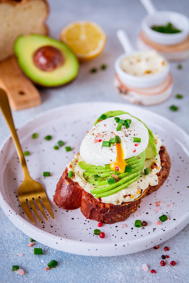 Breakfast toast with avocado and poached egg