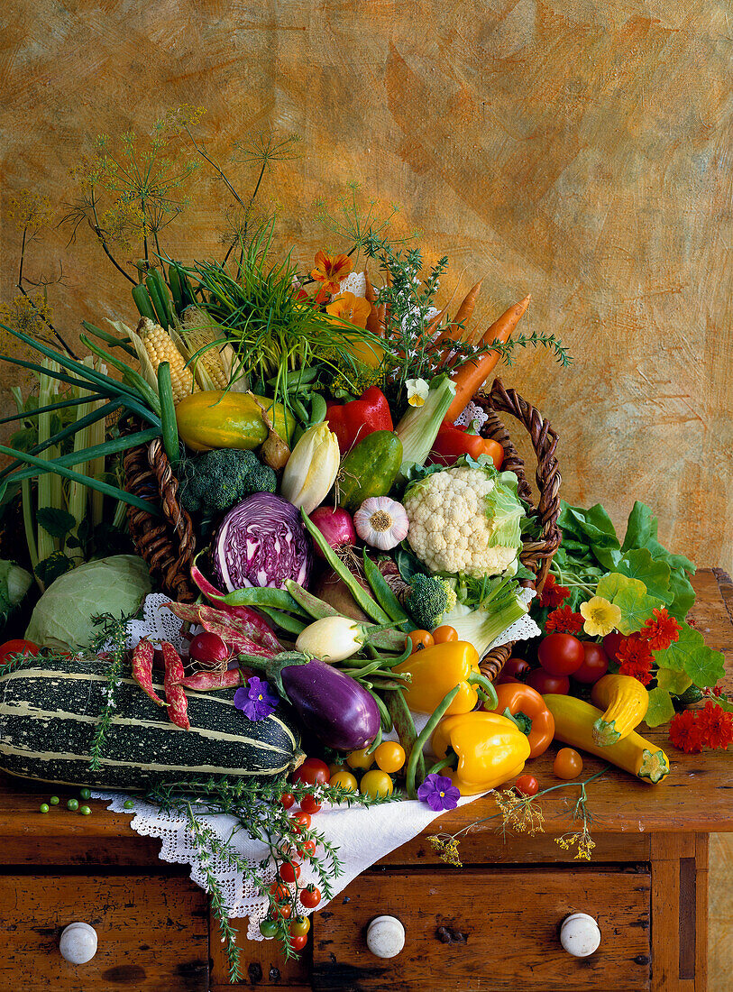 Fresh vegetables and vegetable basket on a wooden table