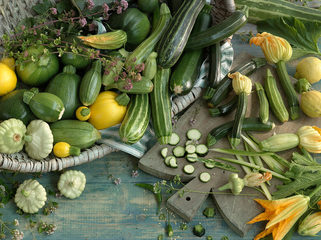 Various varieties of courgettes and courgette flowers