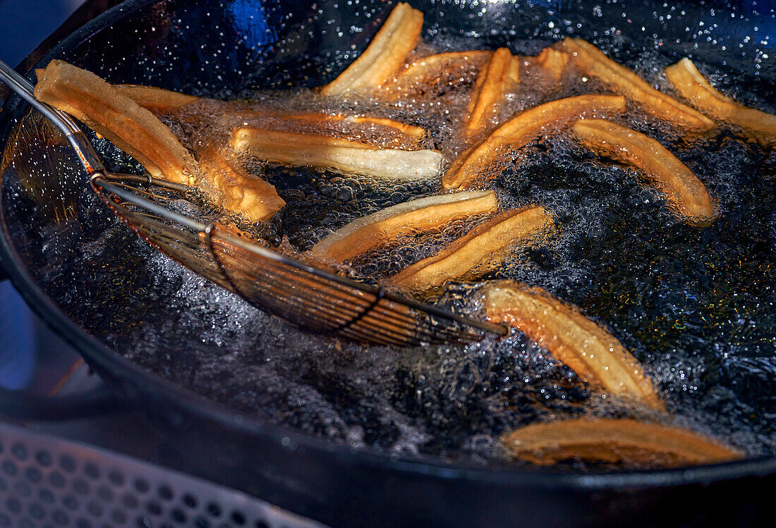 Frying churros