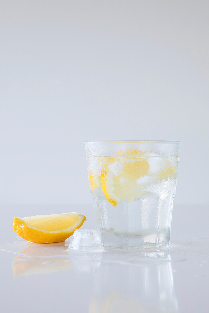 Chilled water and lemon in a glass