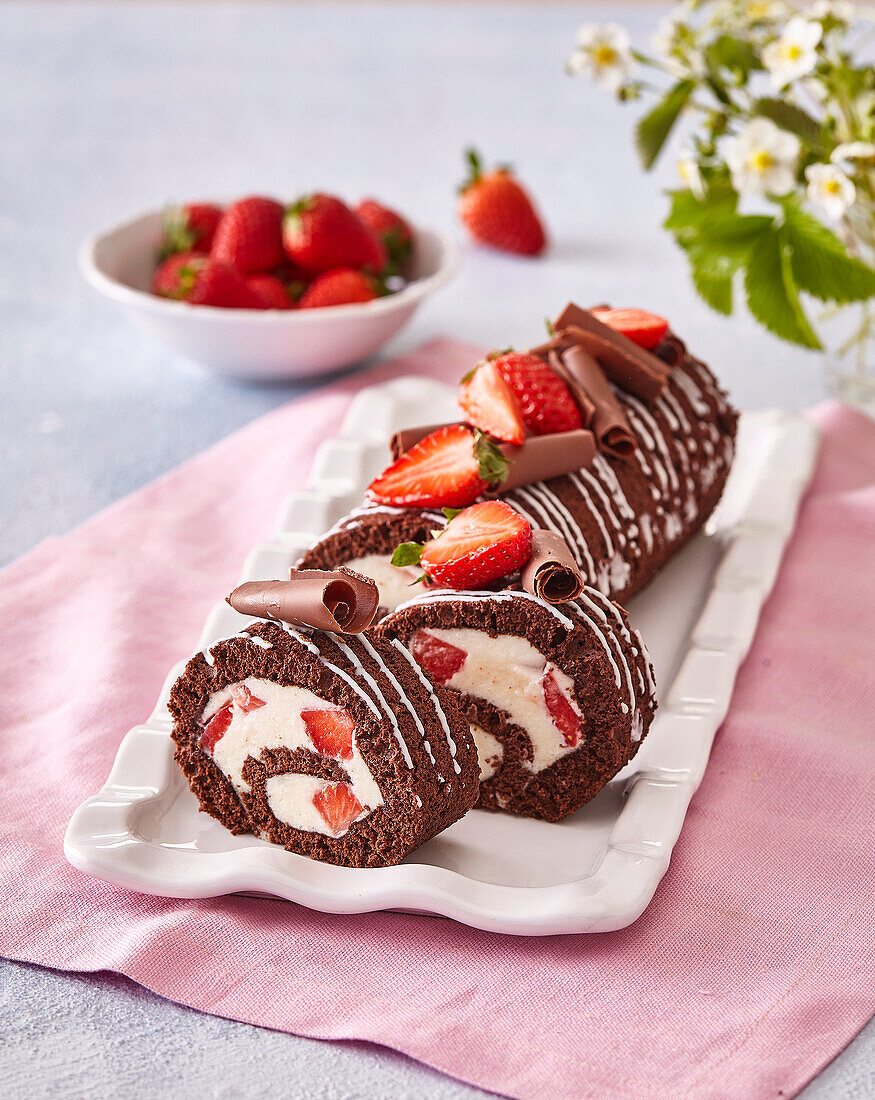 Sweet cocoa roll with strawberries