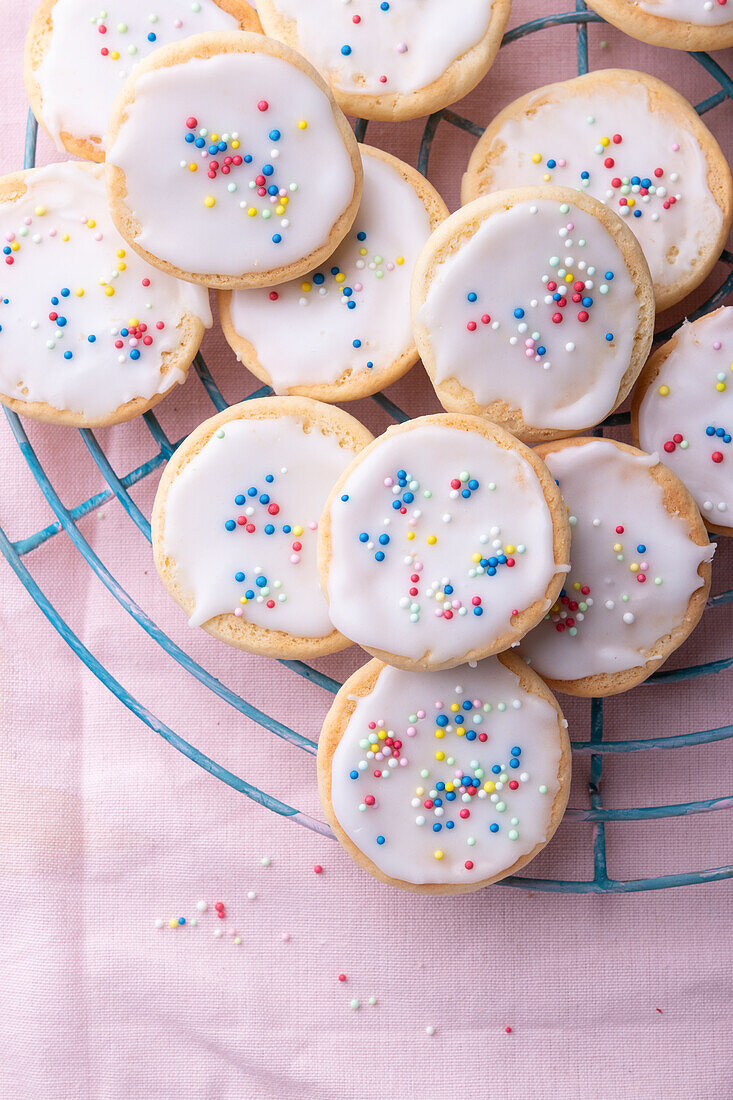 Vegan mini frosted sugar cookies with sugar pearls