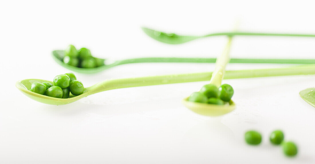 Peas on spoons