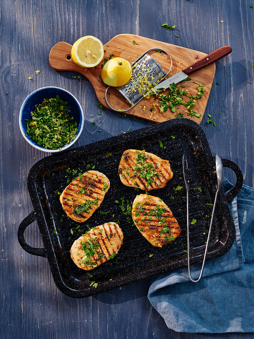 Grilled pork chop with harissa and gremolata