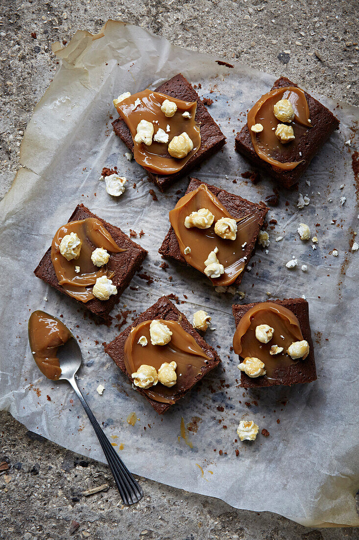 Chocolate brownies with salted caramel and popcorn