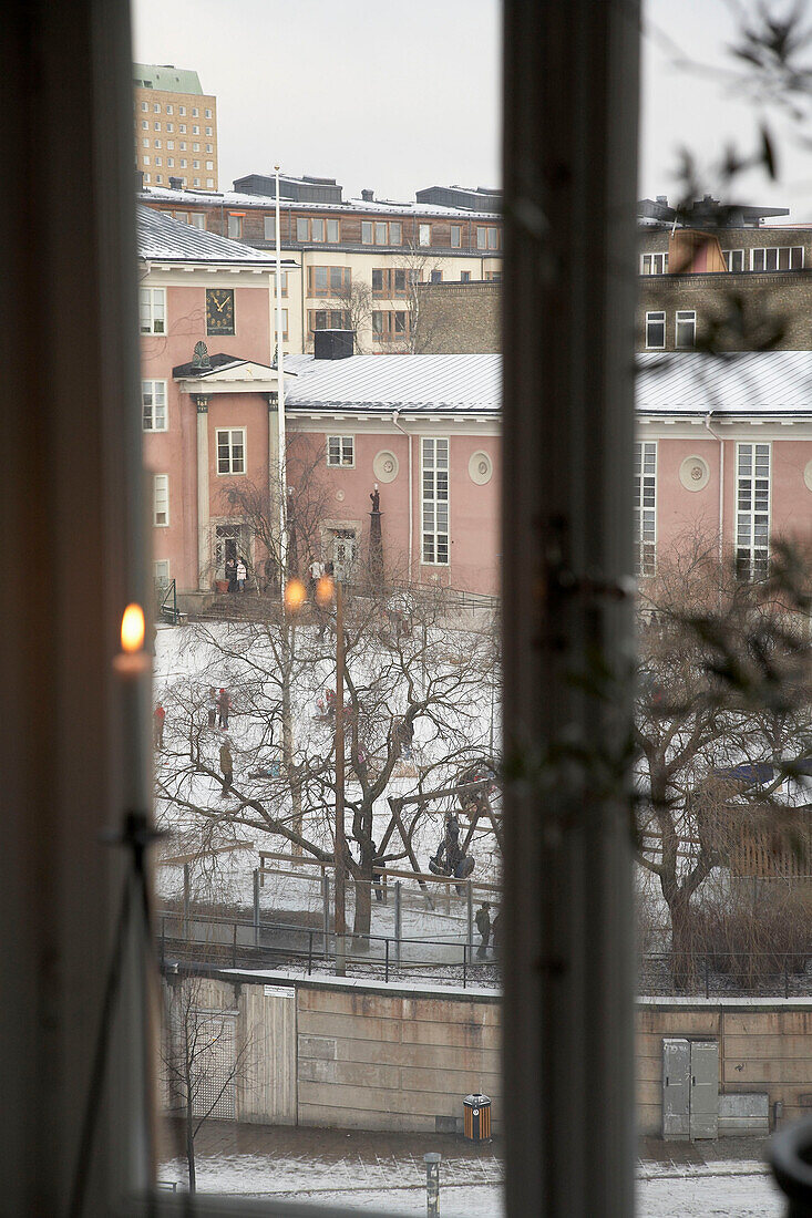 View through French windows of 20th century Stockholm apartment in winter