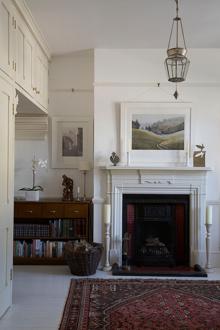 Artwork above original fireplace of Arundel living room, Sussex