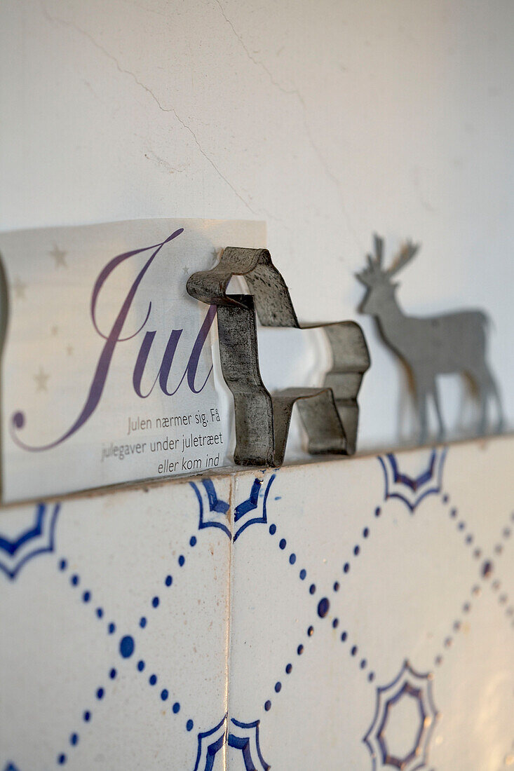 Cookie cutter and reindeer on kitchen wall